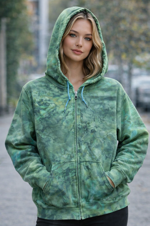 Woman wearing a green tie-dye hoodie outdoors. Dragons Heart Ice Dye Hoodie, Sweatshirt, Hooded, Adult, Youth, Unisex, XS, S, M, L, XL, 2XL, 3XL, 4XL, 5XL, Dyed in UK, Handmade to order
