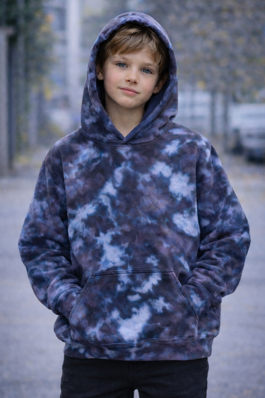 Child wearing a tie-dye hoodie standing outdoors on a street. Snow Maiden Ice Dye Hoodie, Sweatshirt, Zip, Adult, Youth, Unisex, XS, S, M, L, XL, 2XL, 3XL, 4XL, 5XL, Dyed in the UK, Handmade to order