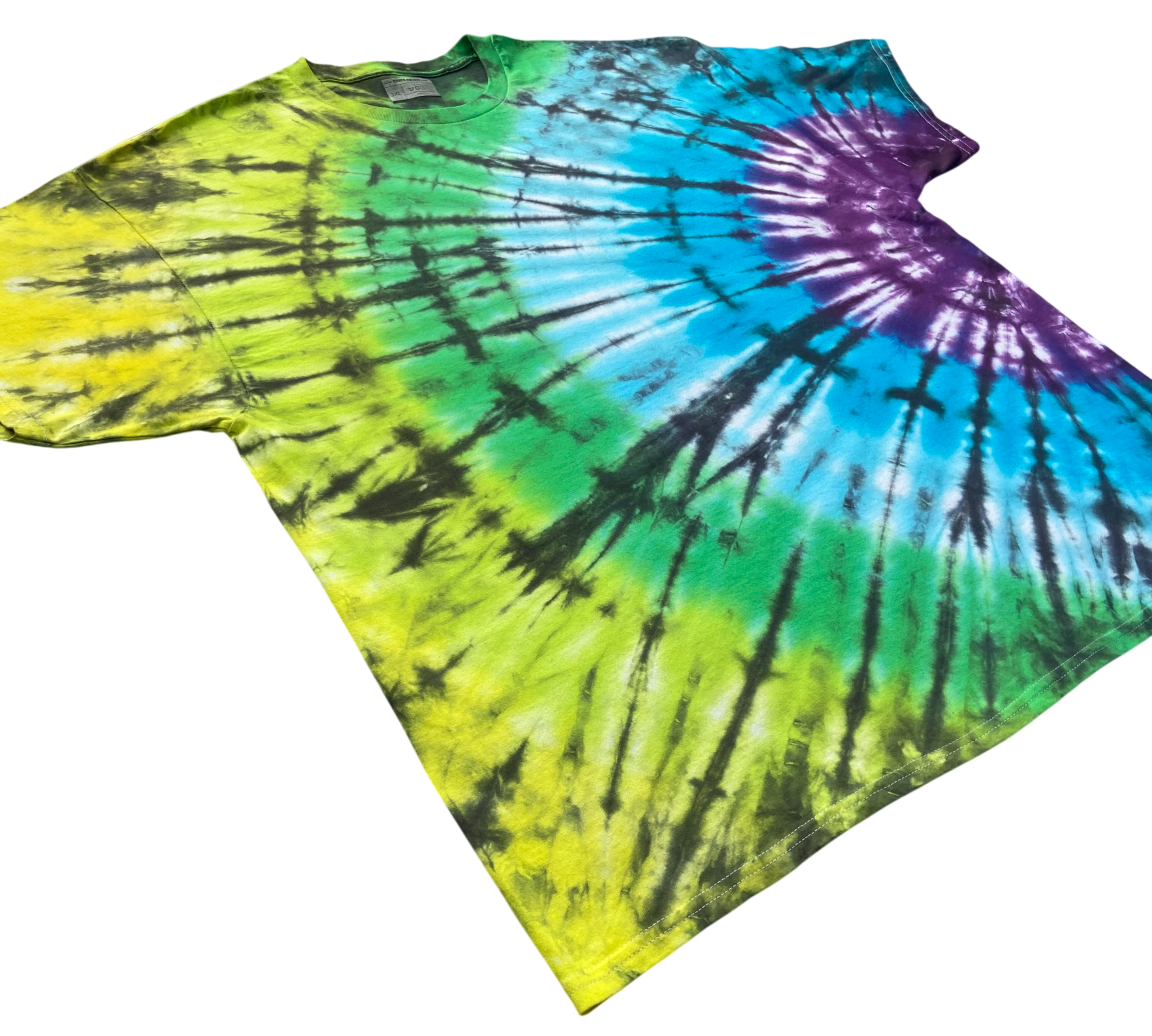 A short-sleeve tie-dye t-shirt laid flat on a white background, featuring a spiral pattern of yellow, green, blue, purple, and black.