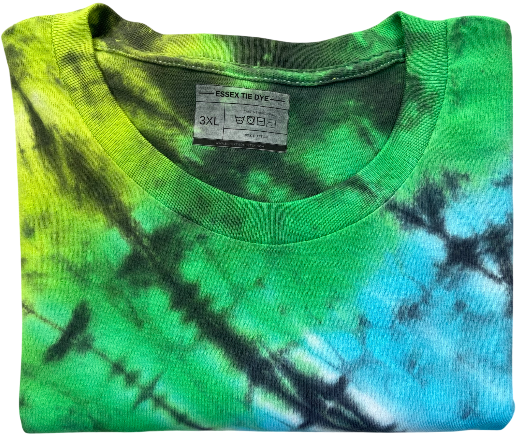 A folded green and blue tie-dye t-shirt with a visible Essex Tie Dye brand label inside the collar.