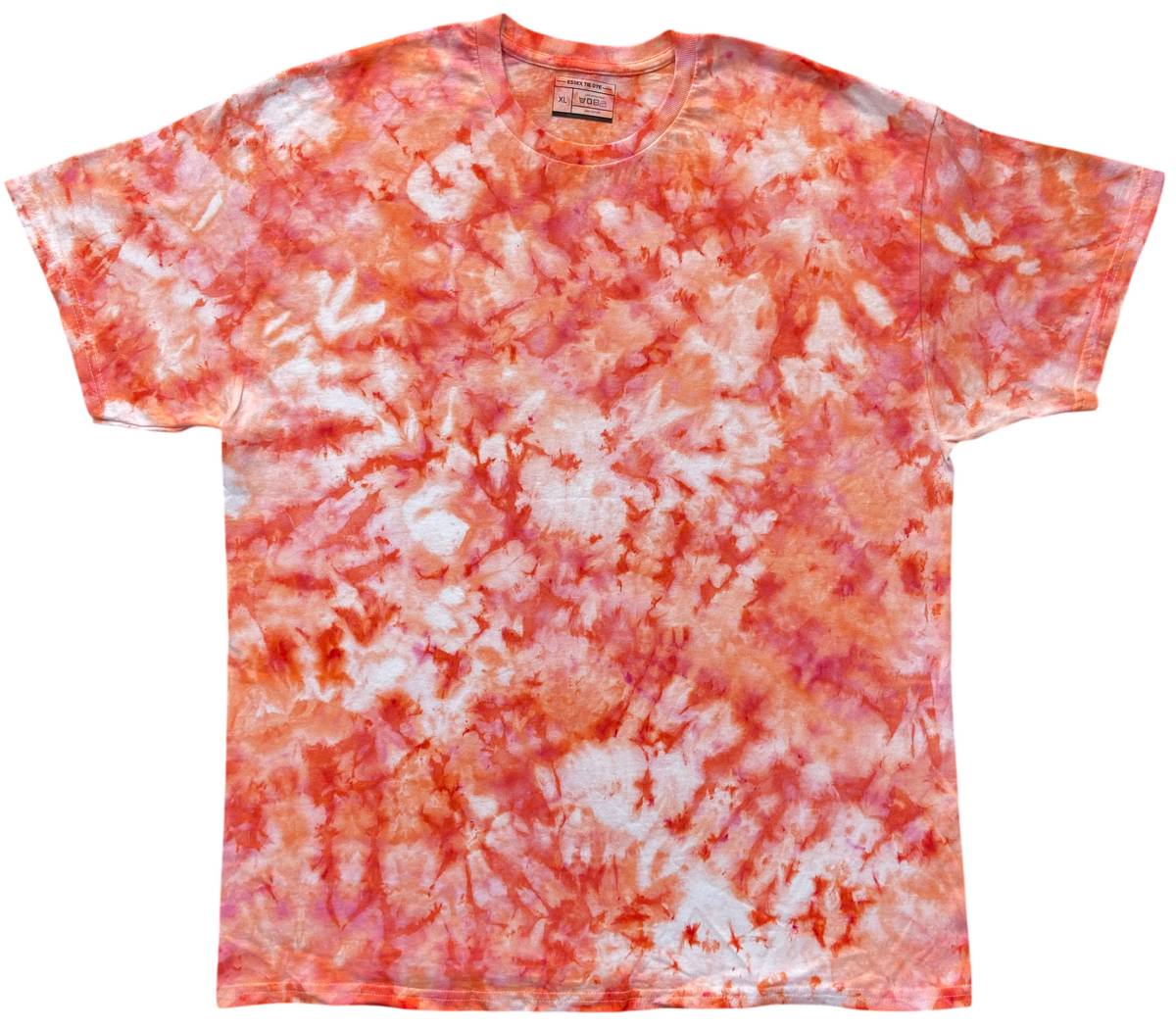 Peach Ice Scrunch tie-dye T-shirt featuring peach, coral pink, soft blush and white marbled patterns, individually hand dyed in the UK.