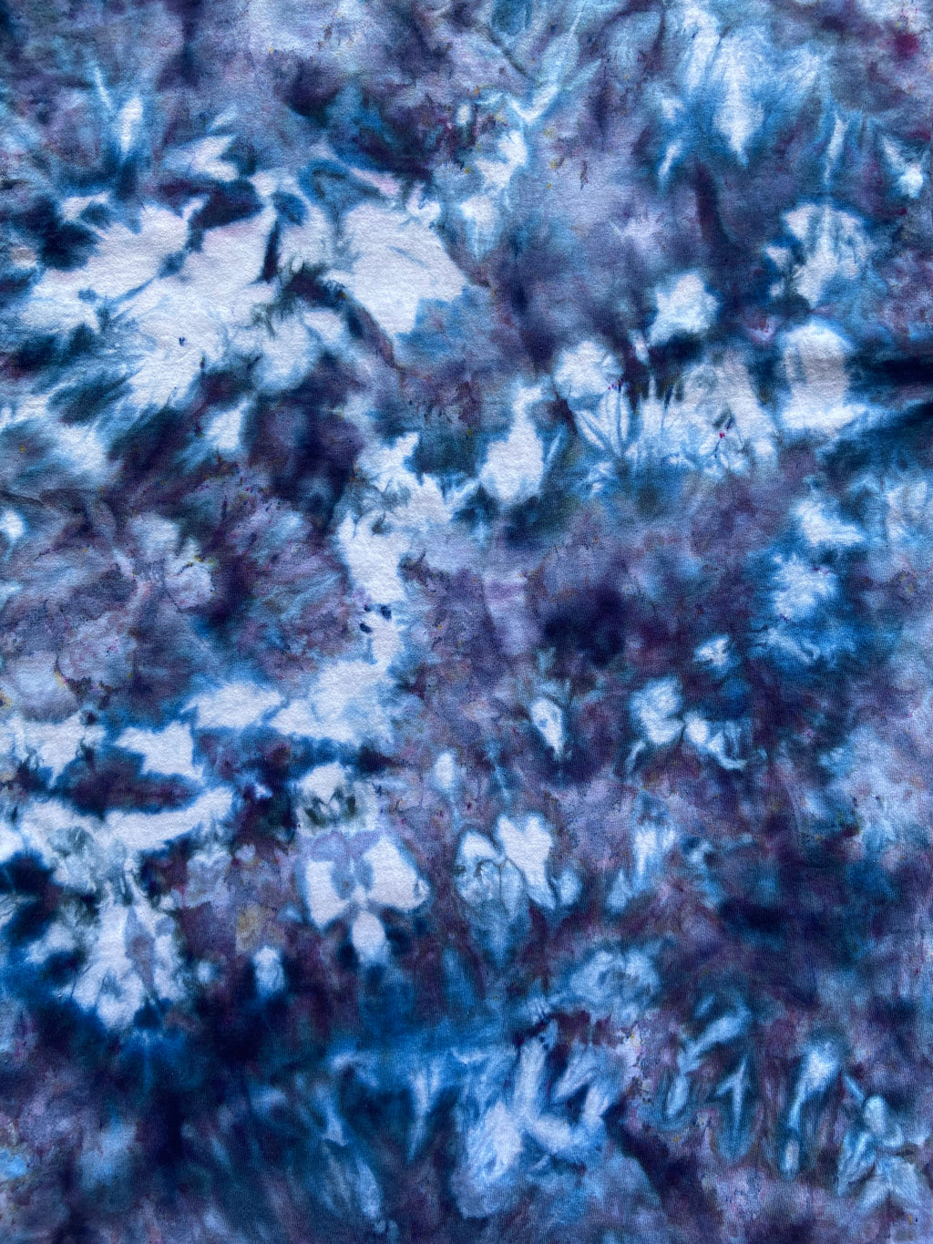 Close-up of a textured surface with blue and white patterns