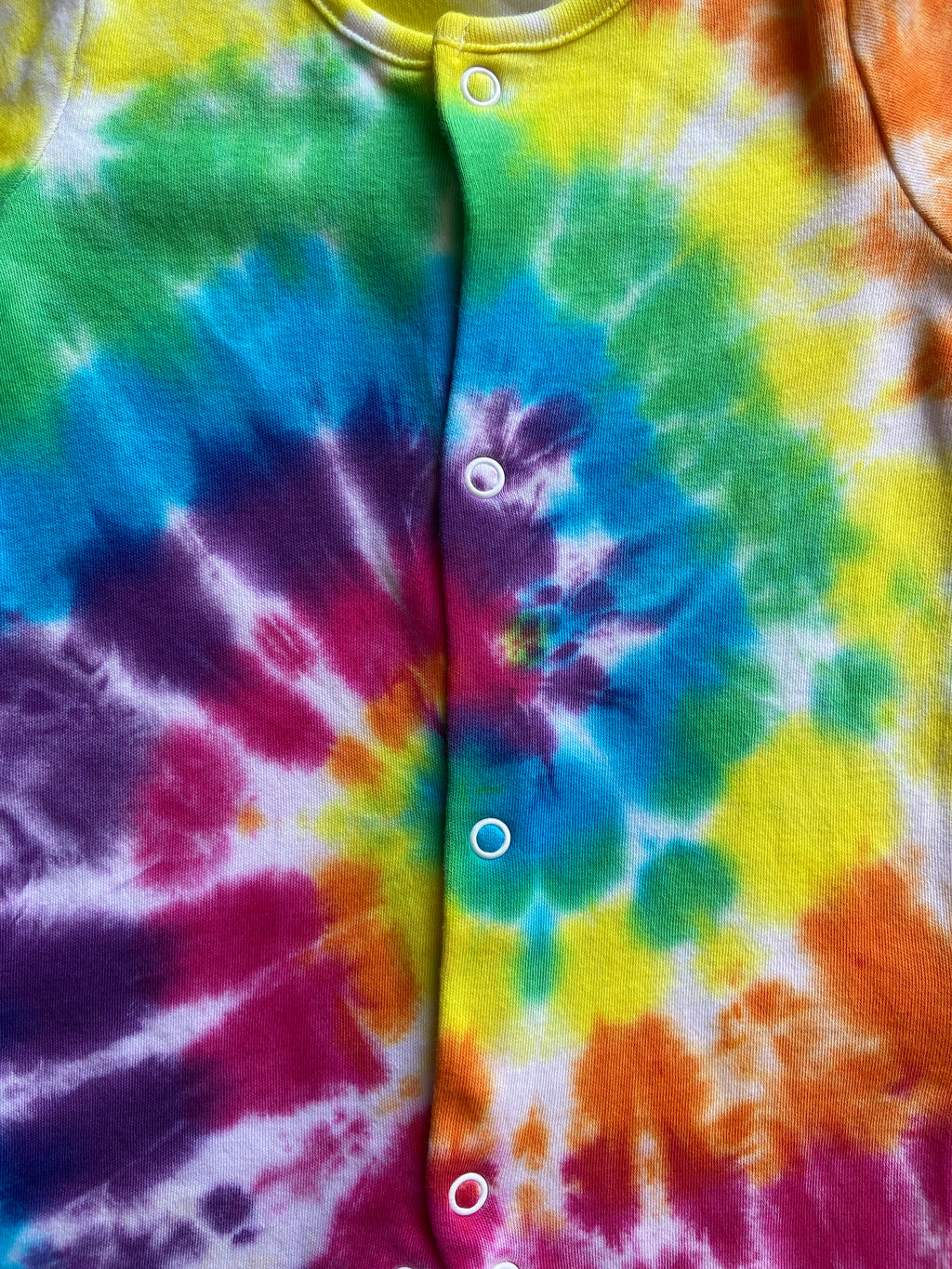Close-up of a tie-dye fabric with multicolor pattern
