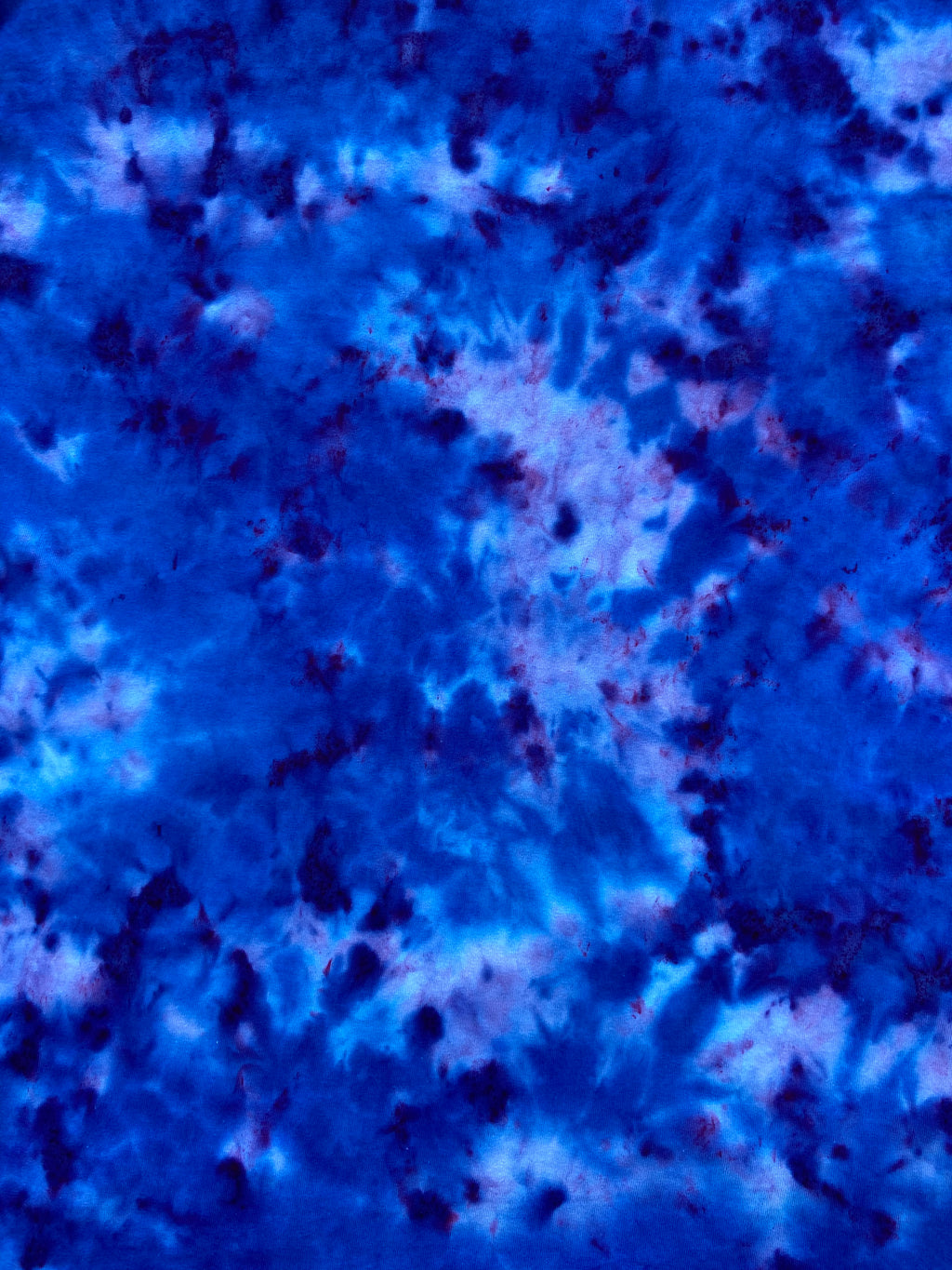 Close-up of Brilliant Blue Ice Scrunch tie-dye fabric showing rich cobalt blue, icy blue and subtle lavender marbled detailing.