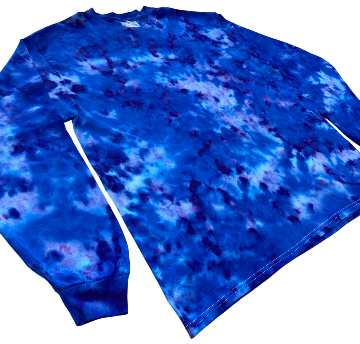 Brilliant Blue Ice Scrunch tie-dye long sleeve T-shirt shown at an angle with bold electric blue tones and soft icy cloud-like patterning.