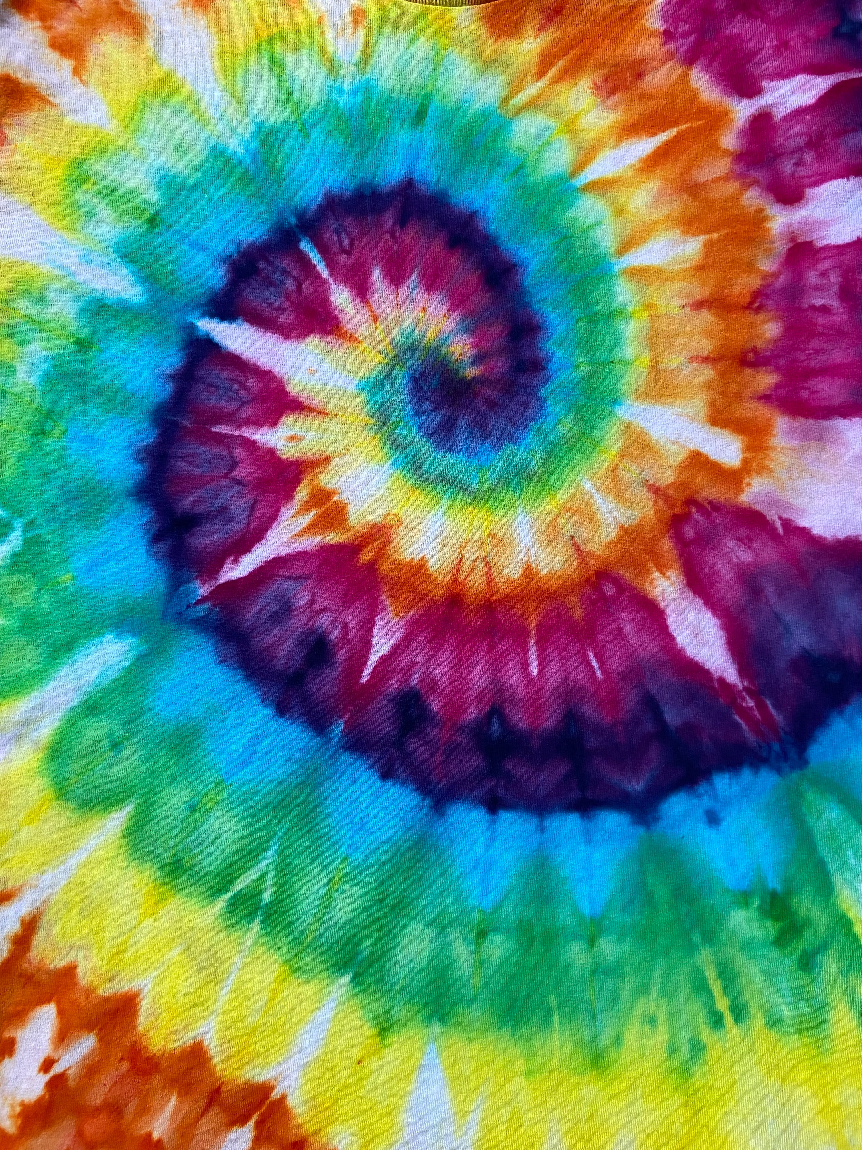 Close-up of a tie-dye pattern with vibrant colors.