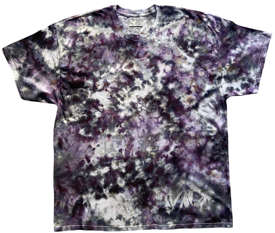 Tie-dye t-shirt with a purple and gray pattern on a white background