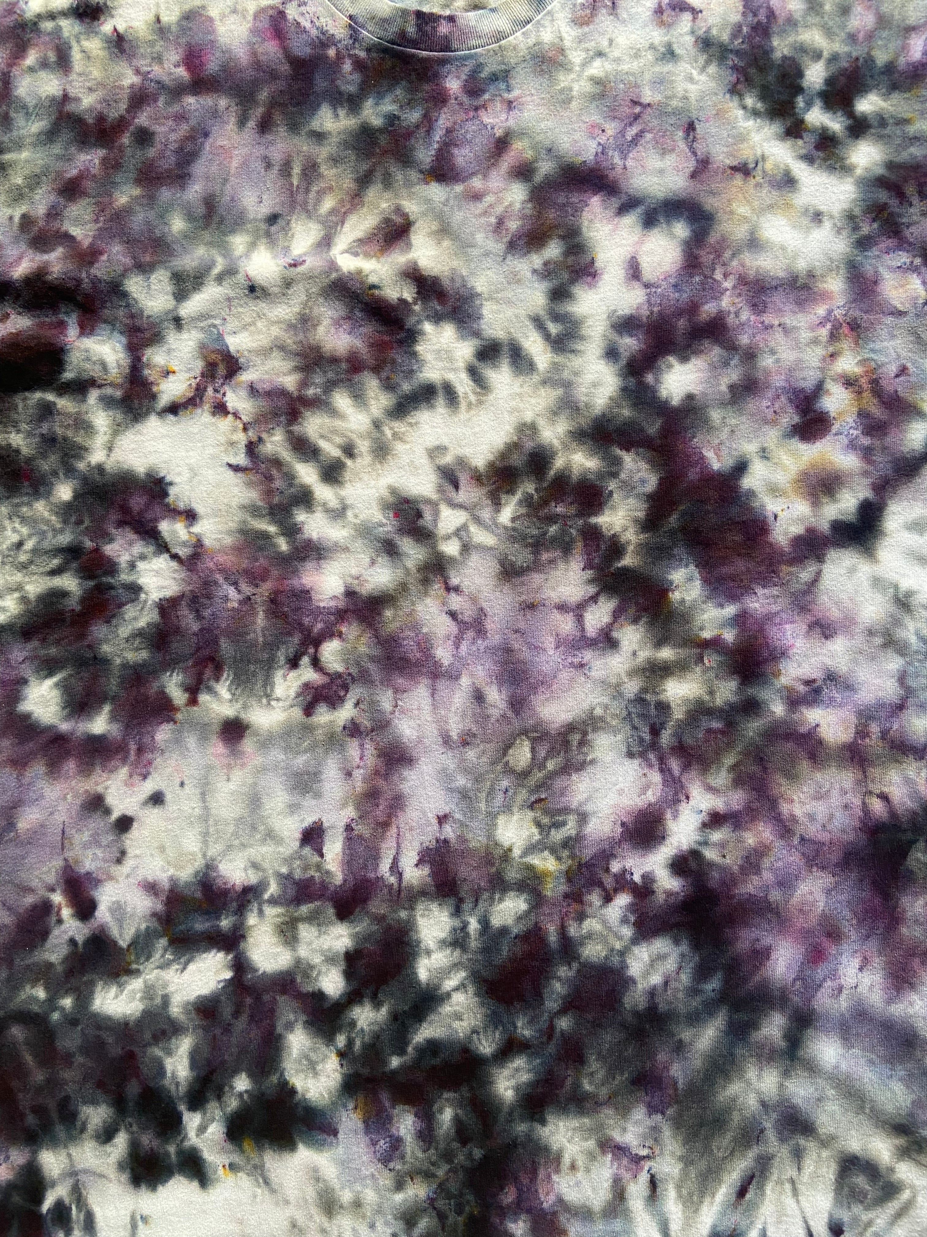 Close-up of a textured surface with purple and gray colors