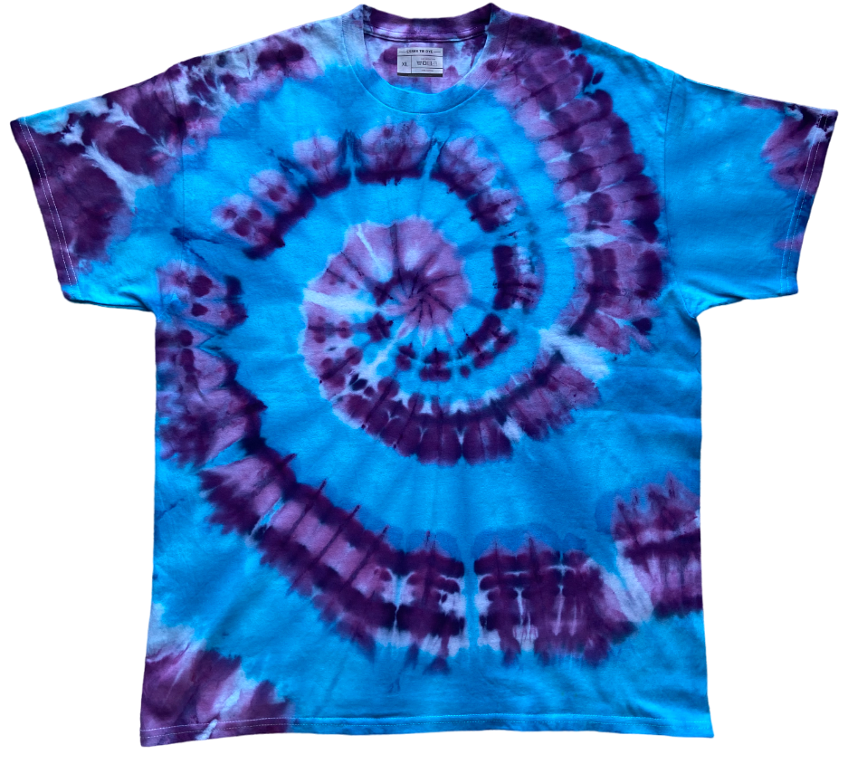 Tie-dye t-shirt with a spiral pattern in blue and purple on a white background