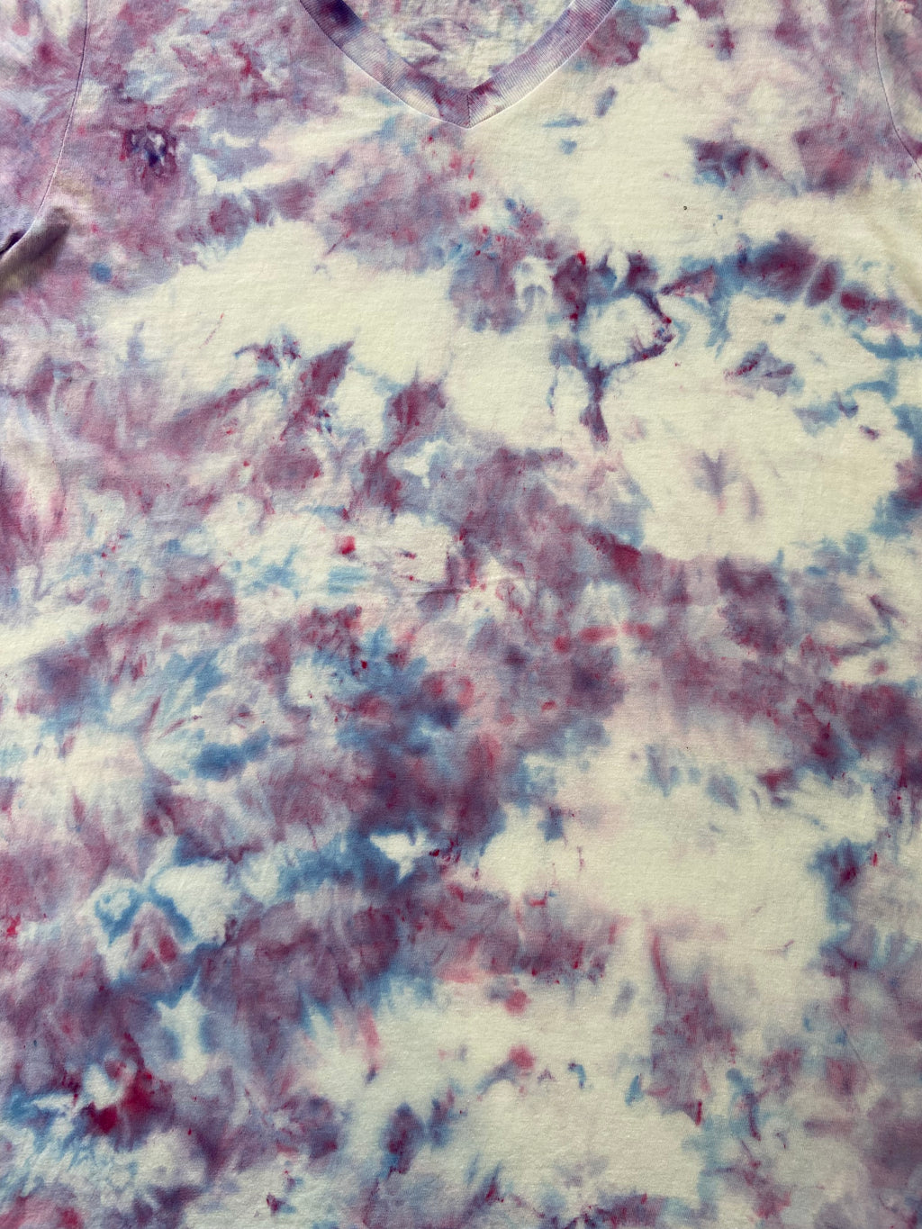 Tie-dye pattern with white, red, and blue colors