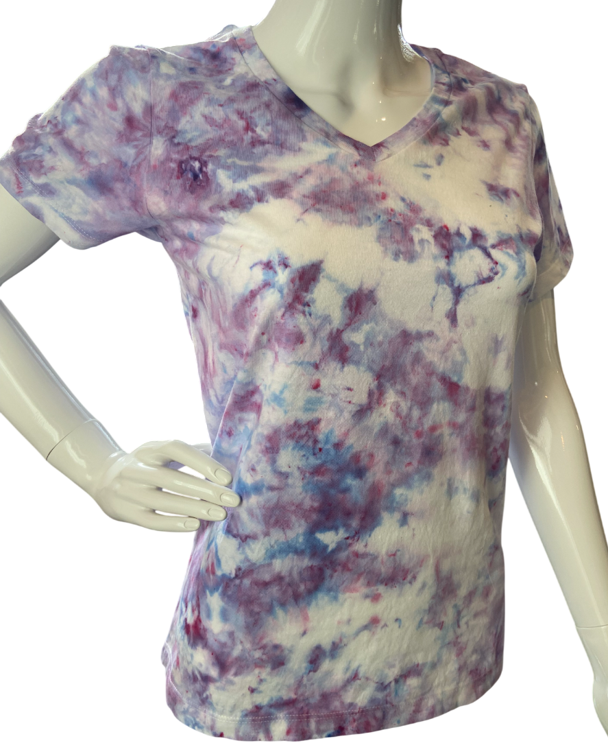 Tie-dye t-shirt on a mannequin against a white background