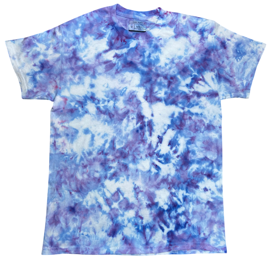 A short-sleeve crewneck t-shirt featuring a blue, purple, and white tie-dye pattern, laid flat against a white background.