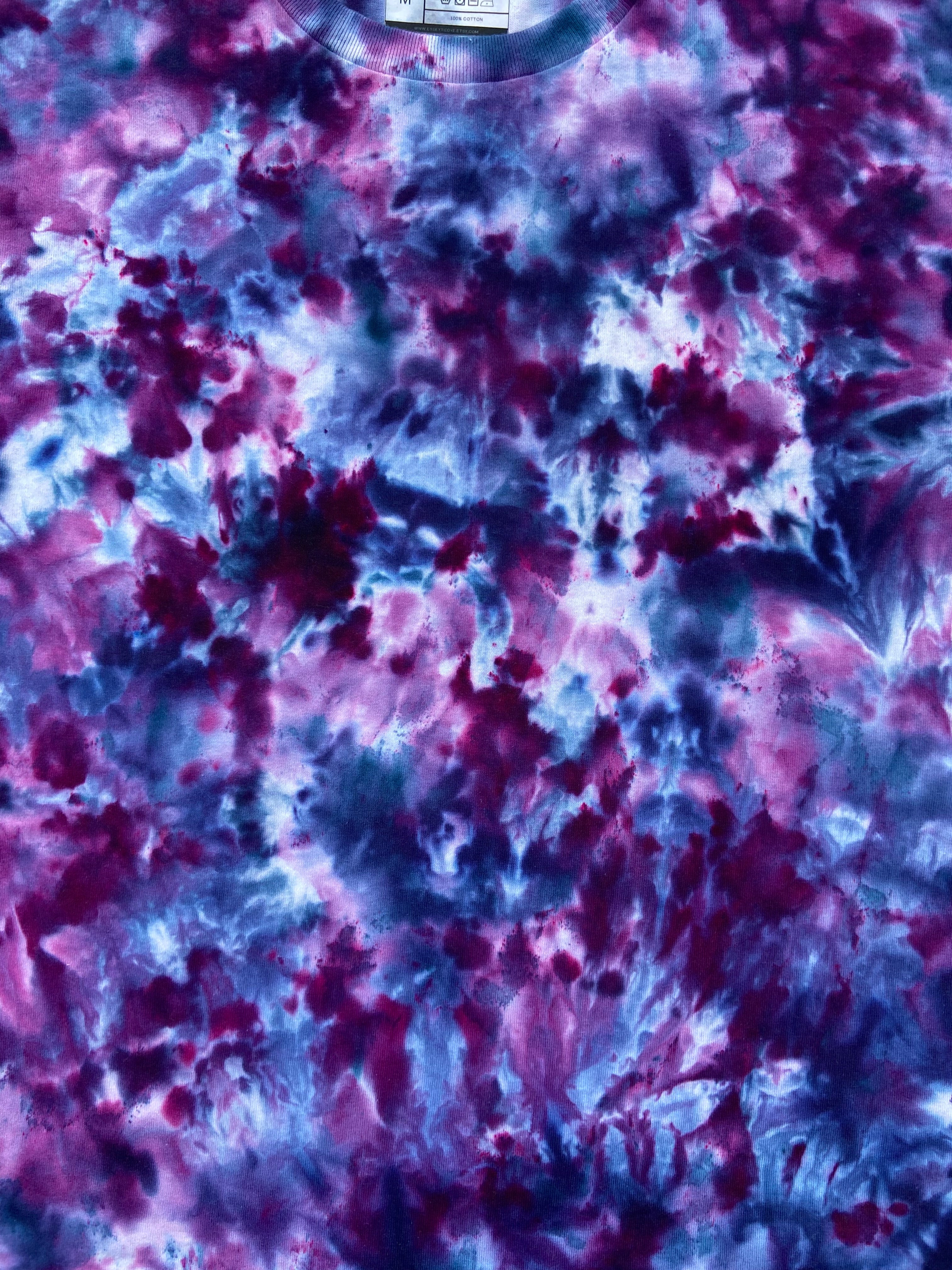 Abstract tie-dye pattern in purple and blue