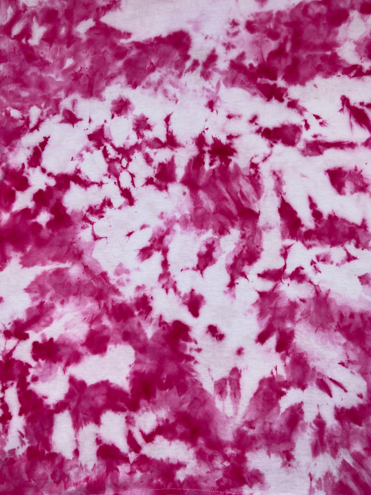 Close-up of the Hot Pink Ice Scrunch tie dye pattern in vivid hot pink and white, showing the hand dyed fabric detail.