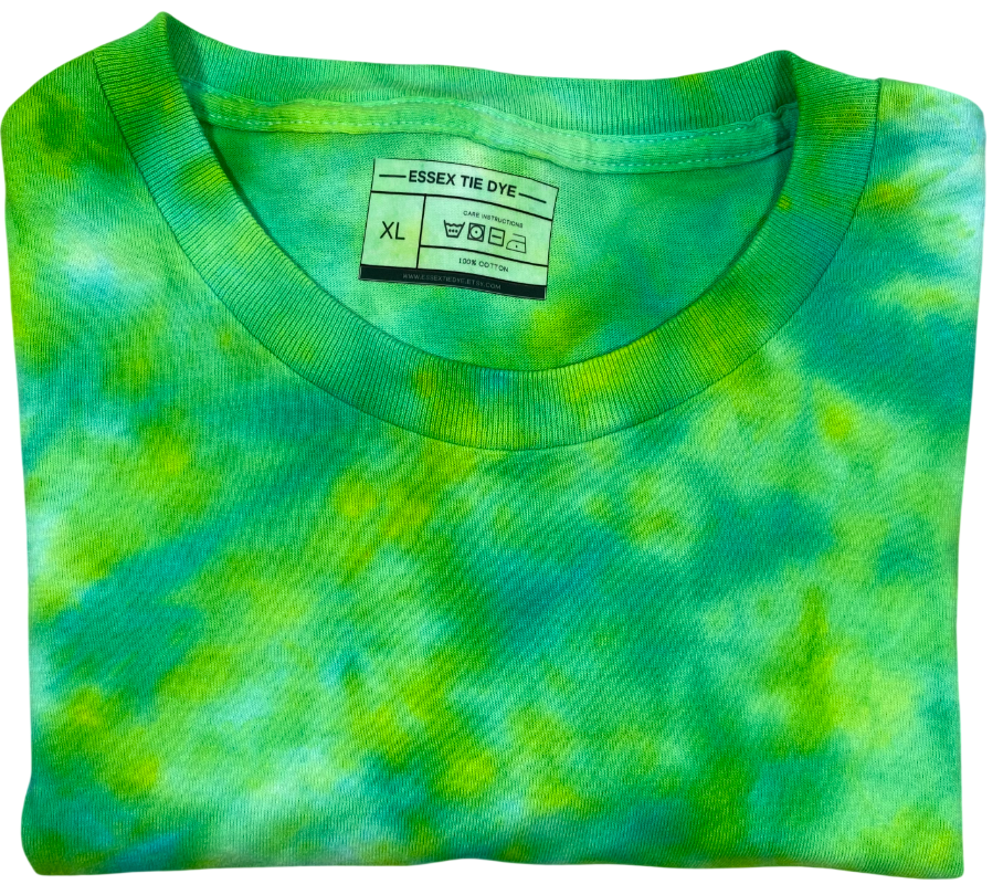 Folded green and blue tie-dye shirt with 'Essex Tie Dye' label.