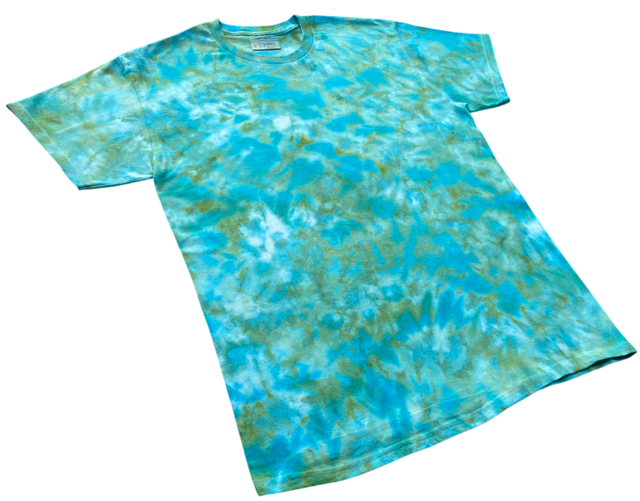 Cayman Isle Green tie-dye T-shirt shown at an angle, featuring aqua blue, turquoise and soft green marbled detailing.