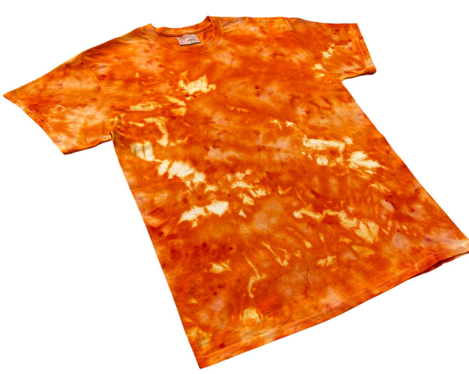 A short-sleeve crewneck t-shirt featuring a vibrant orange and yellow tie-dye pattern with white highlights, shown on a plain white background.