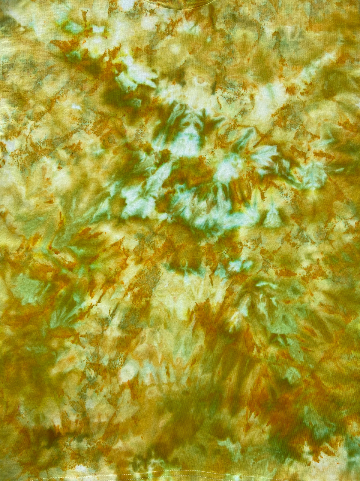 Close-up of the Chartreuse Ice Scrunch tie dye pattern with chartreuse, yellow, olive and pale aqua blended across the fabric.