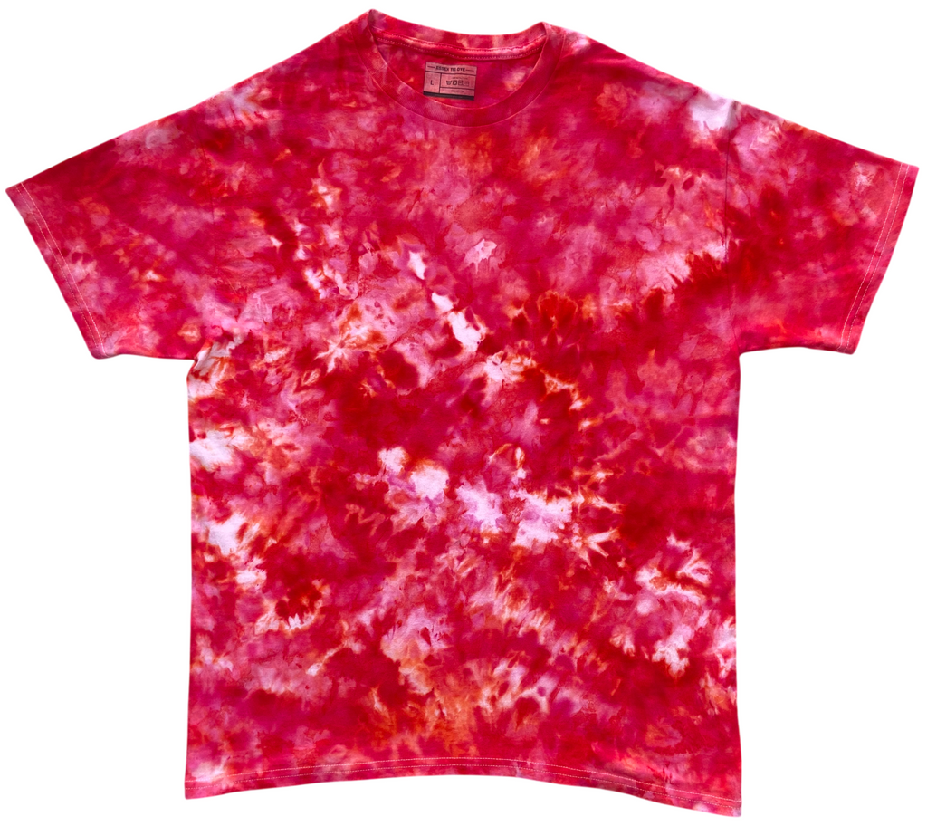 A short-sleeve crewneck t-shirt featuring a vibrant red and pink tie-dye pattern with white and orange accents, displayed flat against a white background.