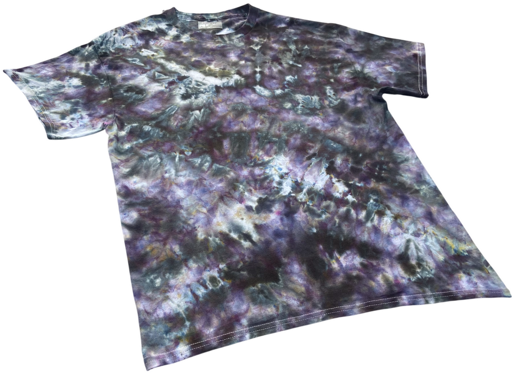 Tie-dye t-shirt with a multicolor pattern of greys and purples on white background