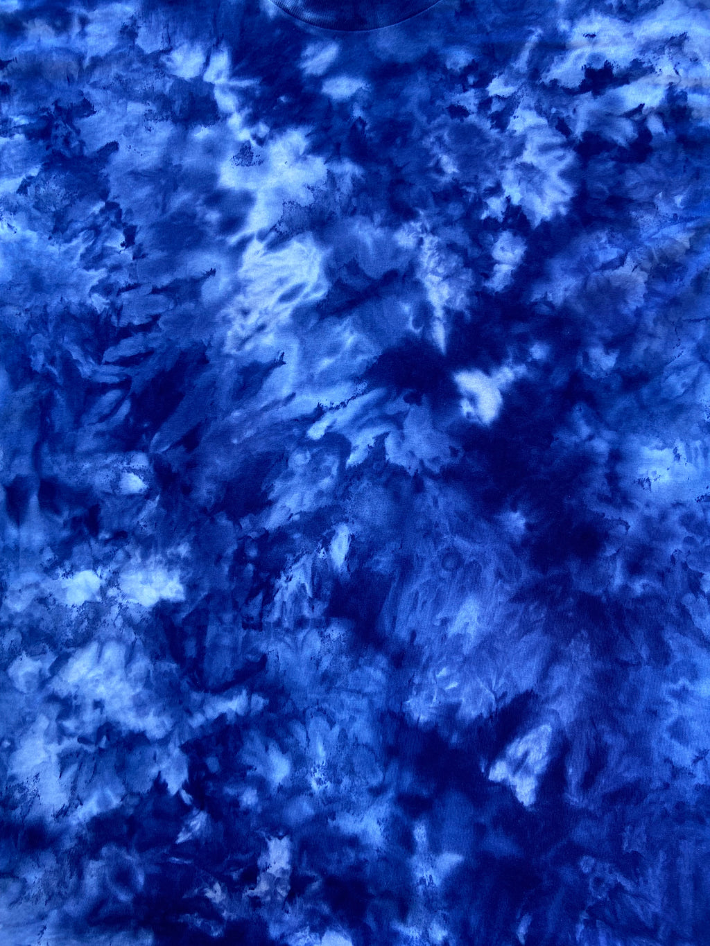Close-up of Houdini Blue Ice Scrunch tie dye fabric in deep royal blue, navy and white tones, individually hand dyed in the UK.