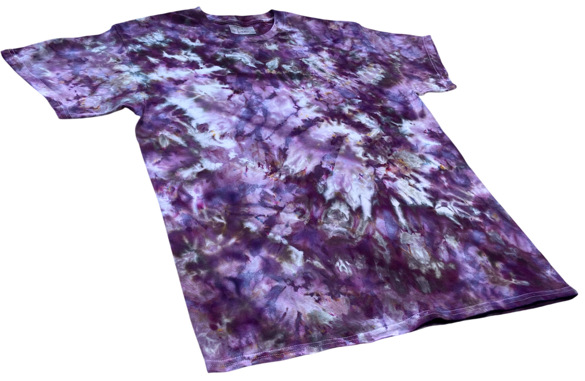 Black Cherry Ice Scrunch tie-dye T-shirt shown at an angle, featuring dark purple, plum and smoky grey tones with lighter icy patterning.