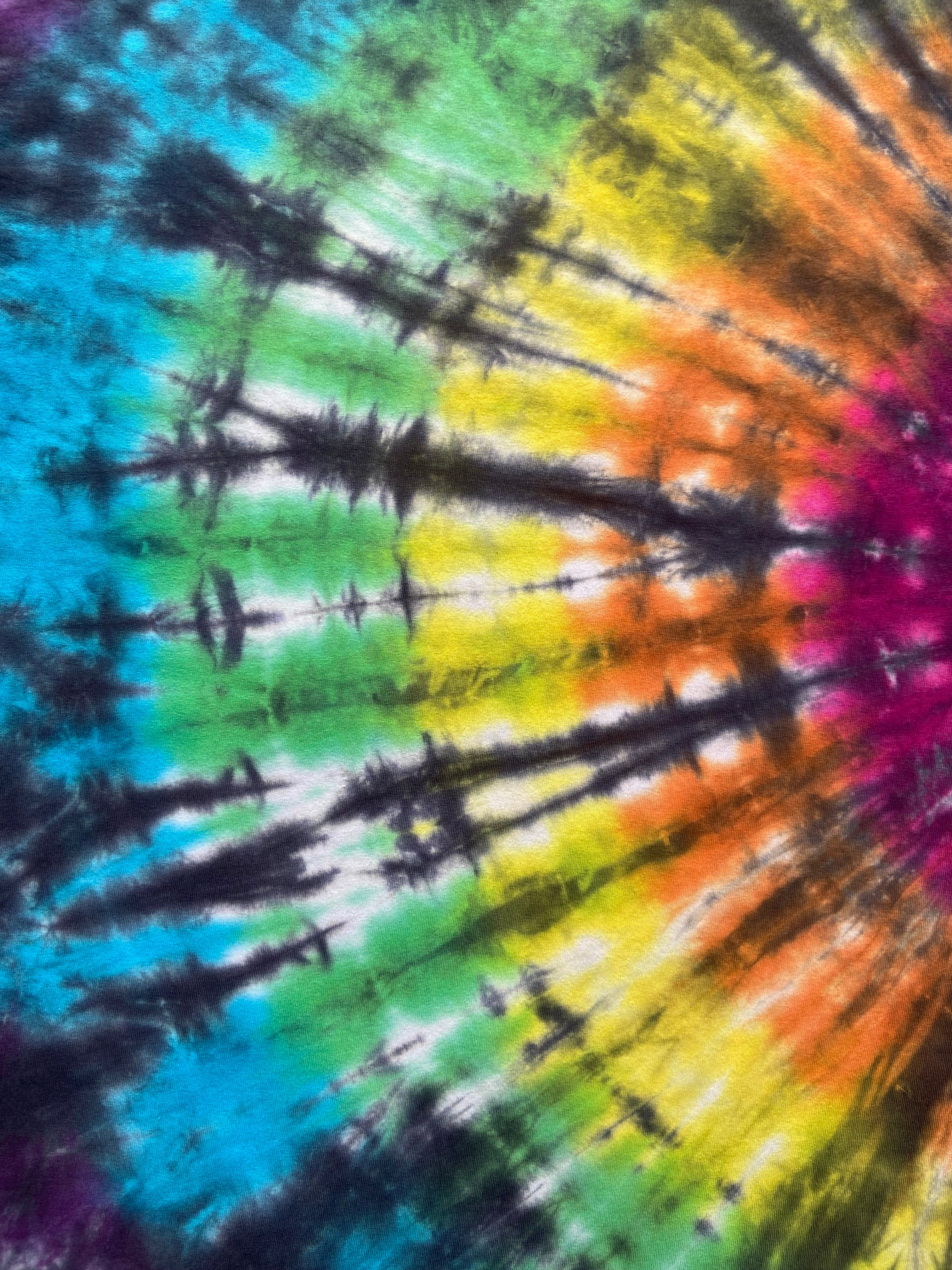 Close-up of a tie-dye fabric with multicolor patterns