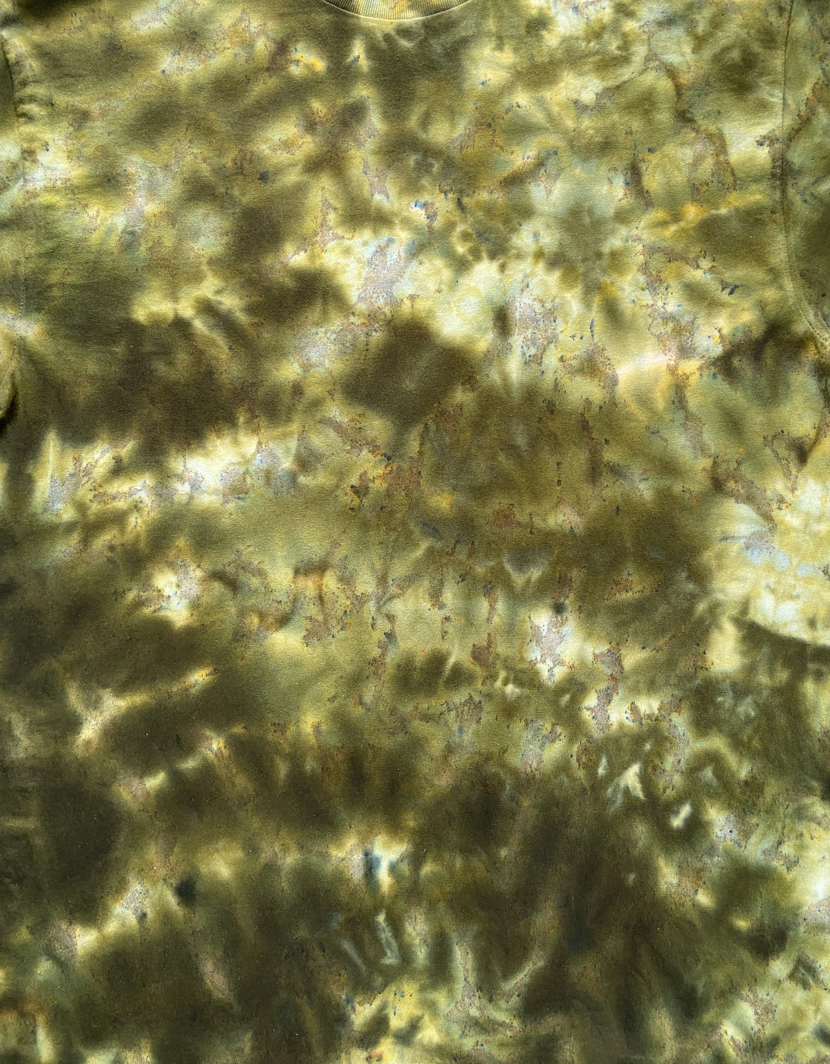 Close-up of Moss Green Ice Tie Dye fabric showing intricate olive green, golden yellow and cream marbled ice dye patterns.