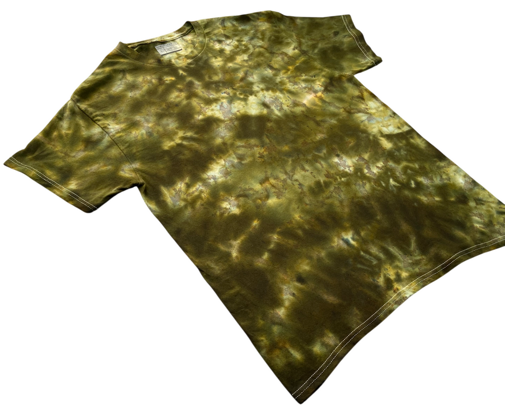 Moss Green Ice Tie Dye T-shirt shown at an angle, featuring rich moss green, olive and golden earthy tones with organic marbled detailing.