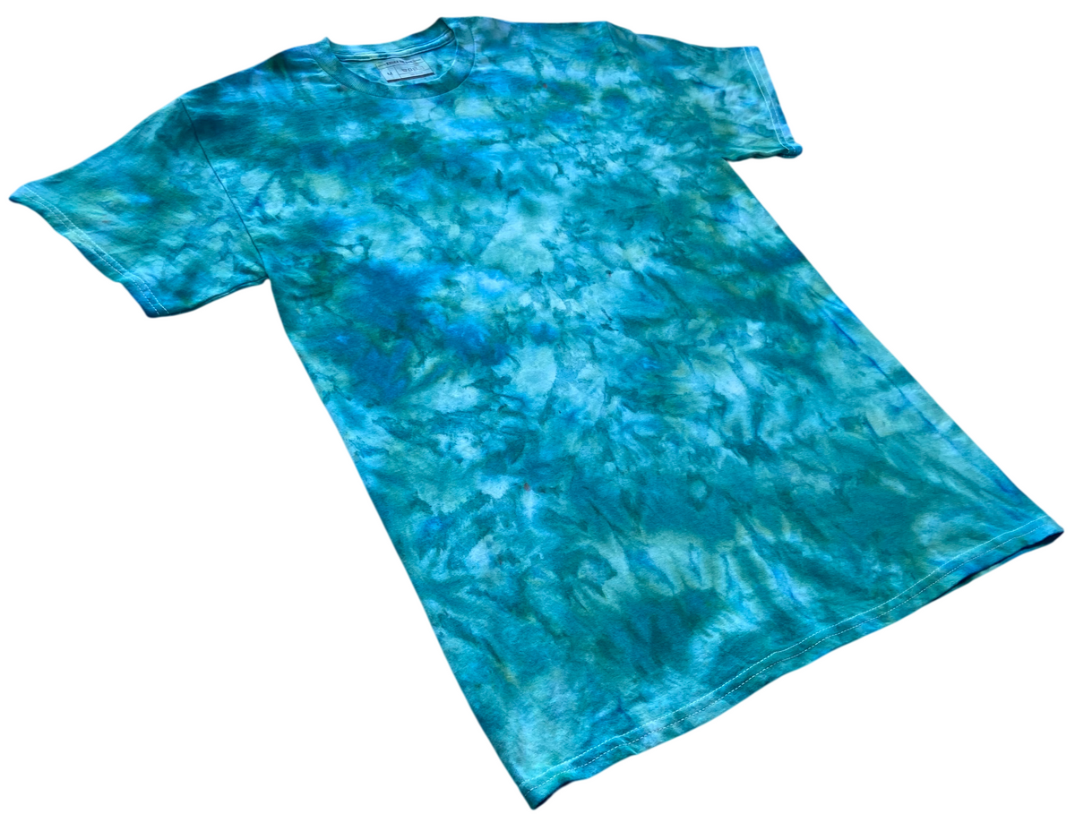 Kingfisher Blue ice scrunch tie-dye T-shirt shown at an angle, featuring turquoise, teal, aqua blue and deeper blue-green hand-dyed patterns.