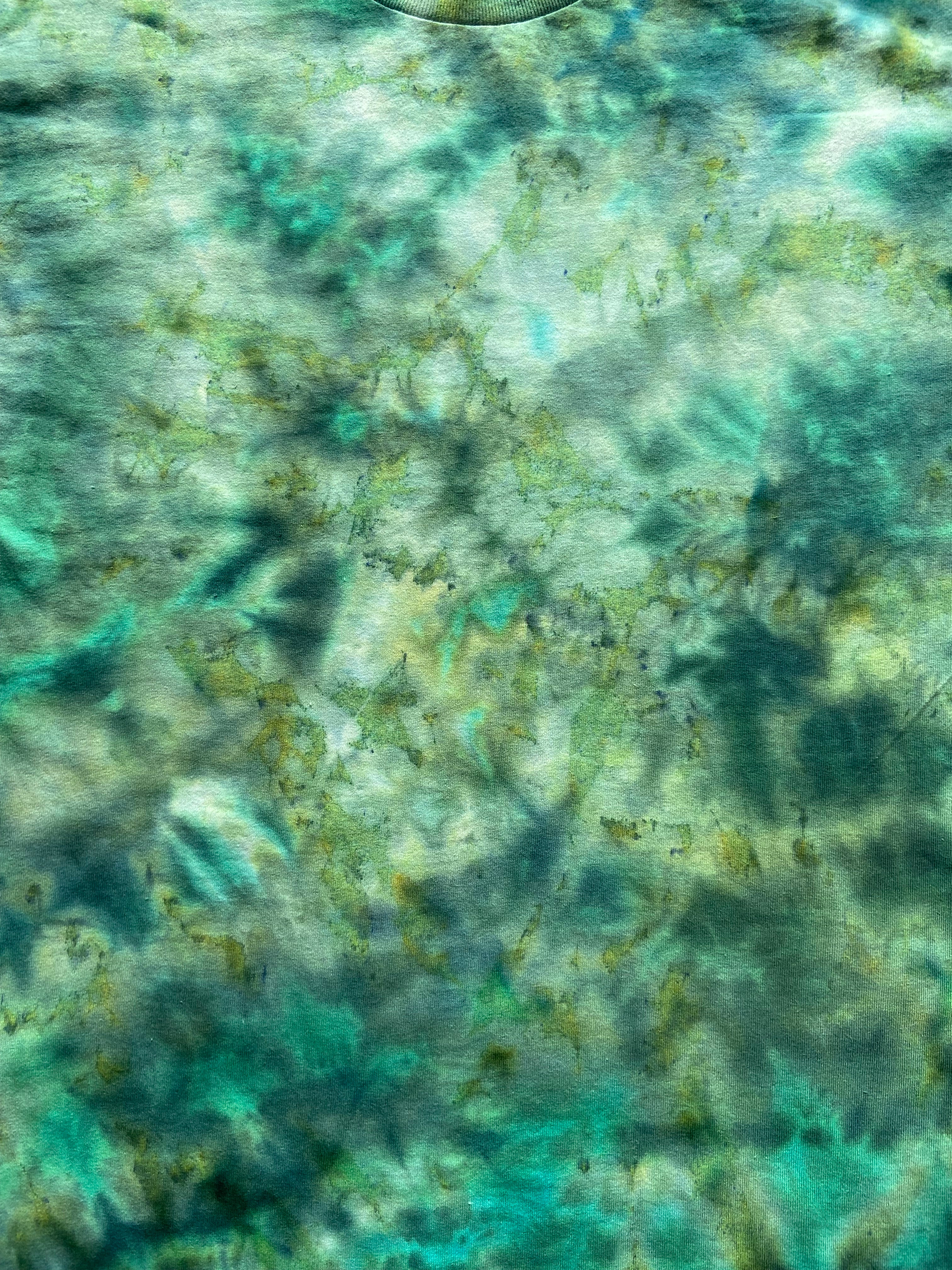Close-up of a textured green surface with patterns