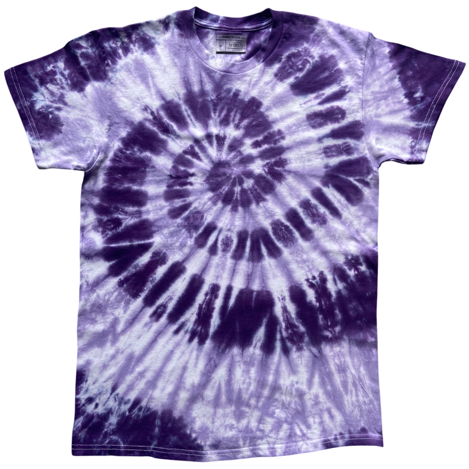 A short-sleeve crewneck t-shirt featuring a purple and white spiral tie-dye pattern, laid flat against a solid white background.
