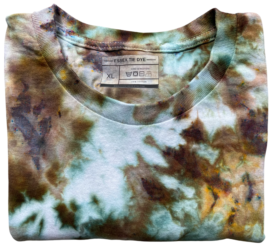 Tie-dye shirt with a visible label on a white background