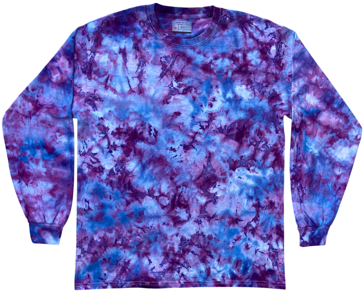 Hydrangea Ice Scrunch tie-dye T-shirt shown at an angle, featuring delicate lilac, pink, blue and white tones.