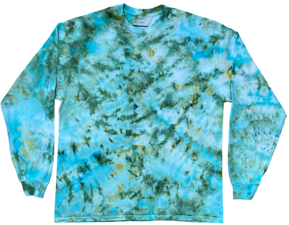 Sea Glass Ice Scrunch long sleeve tie dye T-shirt featuring soft aqua blue, turquoise, sea green and sandy gold marbled patterns.