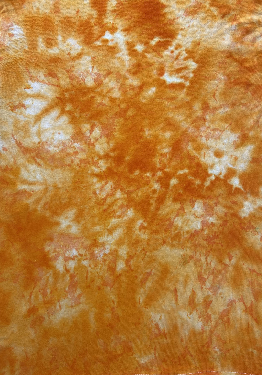 Close-up of the Deep Yellow Ice Scrunch tie dye pattern in rich golden yellow and orange with lighter cream areas, showing the hand dyed fabric detail.