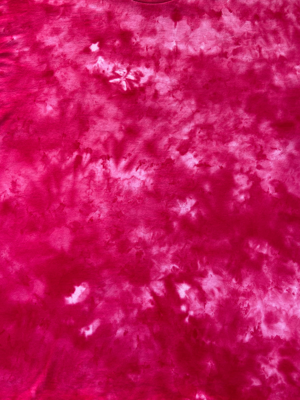 Close-up of the Light Red Ice Scrunch tie dye pattern in vivid pink-red and pale pink, showing the hand dyed fabric detail.