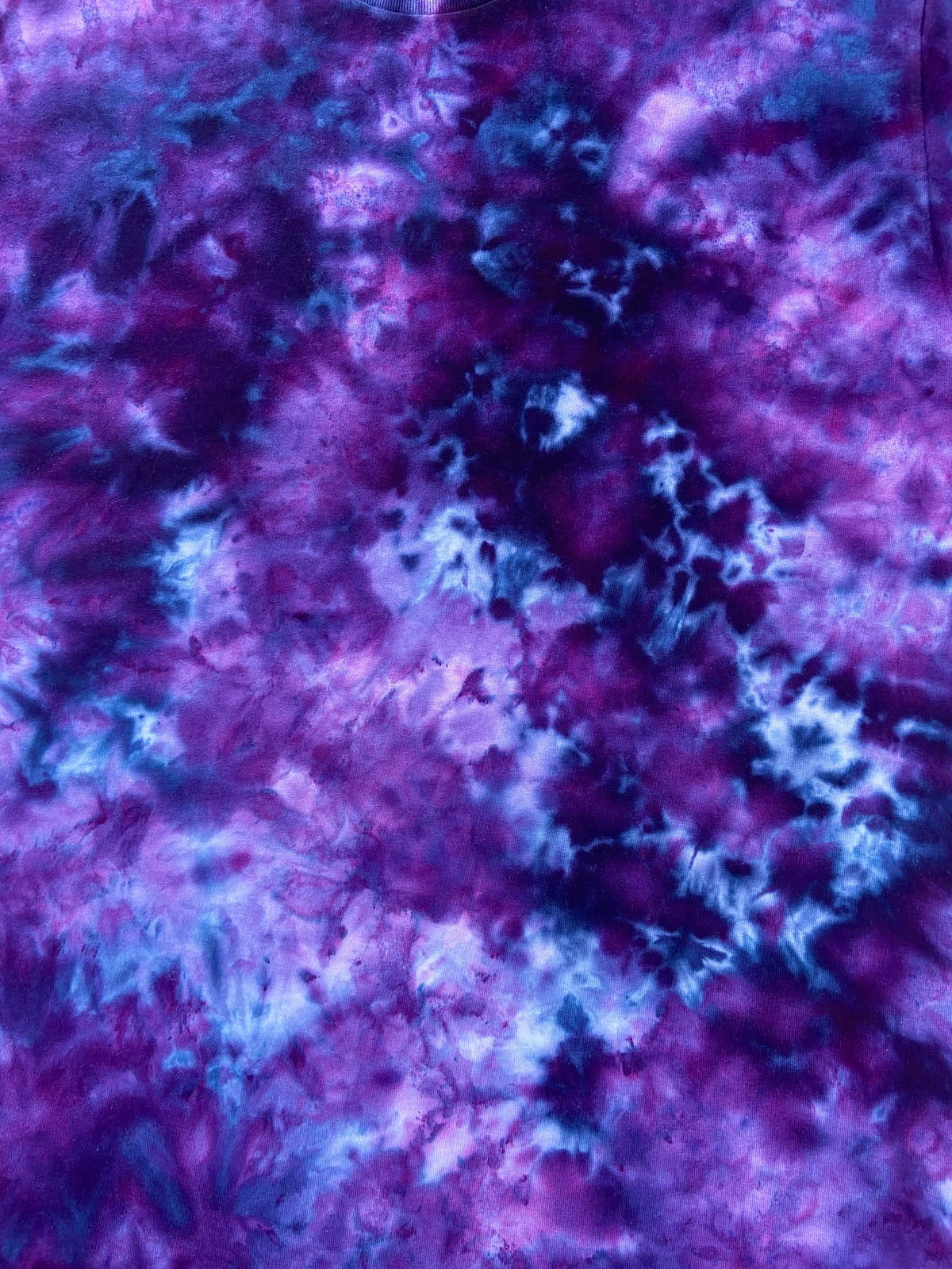 Close-up of Power Berry Ice Scrunch tie dye fabric in deep purple, berry, violet and blue tones, individually hand dyed in the UK.